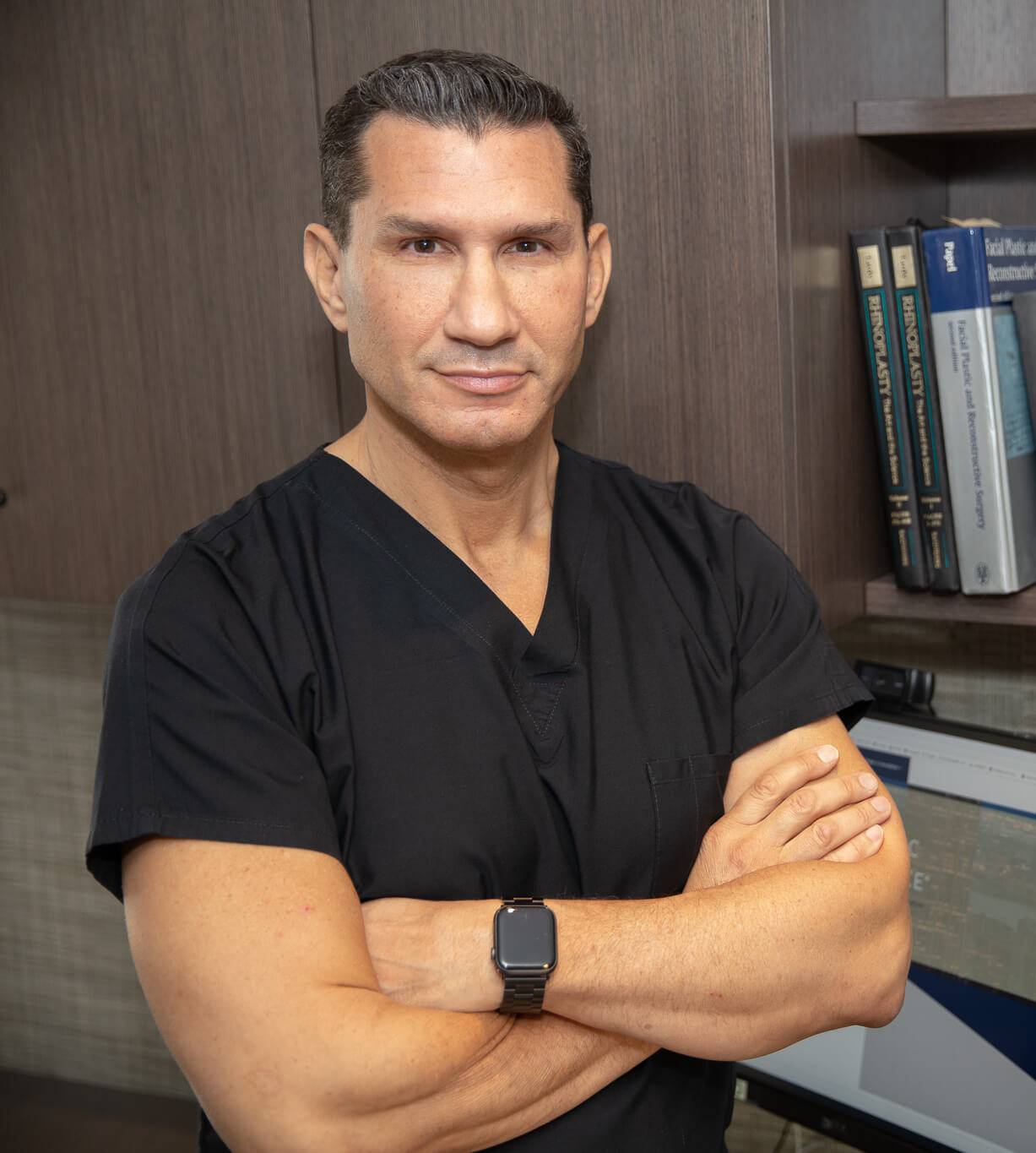 Headshot of Dr. Philip Miller in Medical Smocks in his Manhattan Office