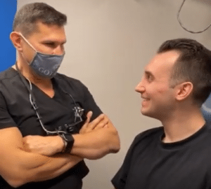 rhinoplasty surgeon, Dr. Philip Miller consulting with a patient in NYC